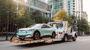 Towing AWD and Electric Vehicles Safely With a Flatbed Tow Truck